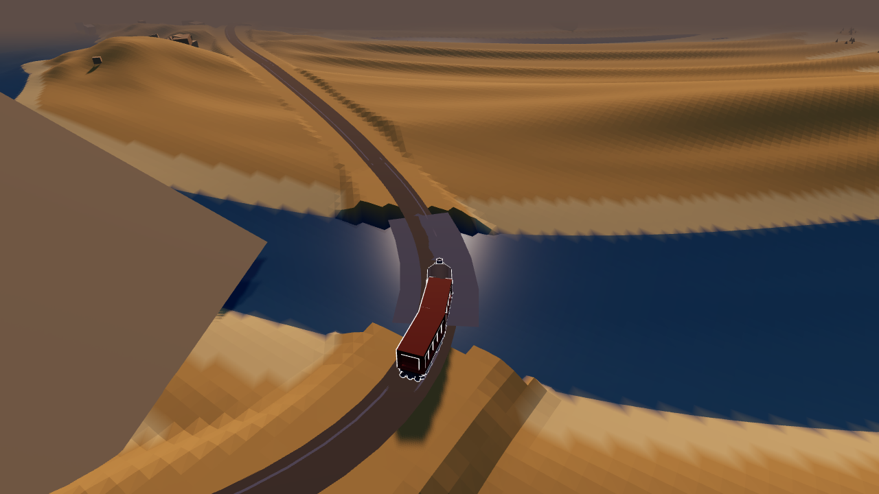 The train crossing a bridge over blue water between desert dunes