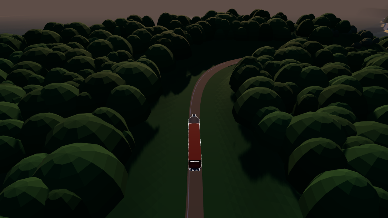 The train on a line through dense woodland at dusk